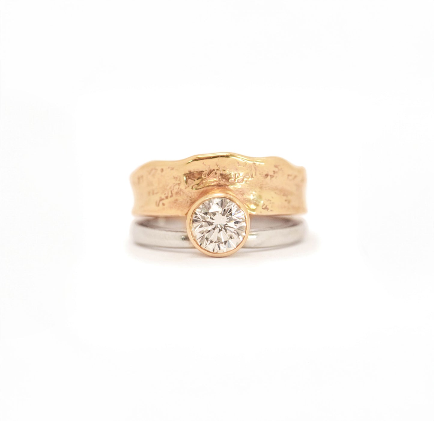 14k Escarpment Solitaire featuring a Diamond
