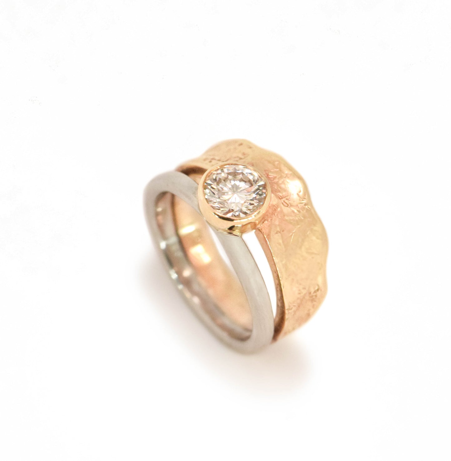 14k Escarpment Solitaire featuring a Diamond